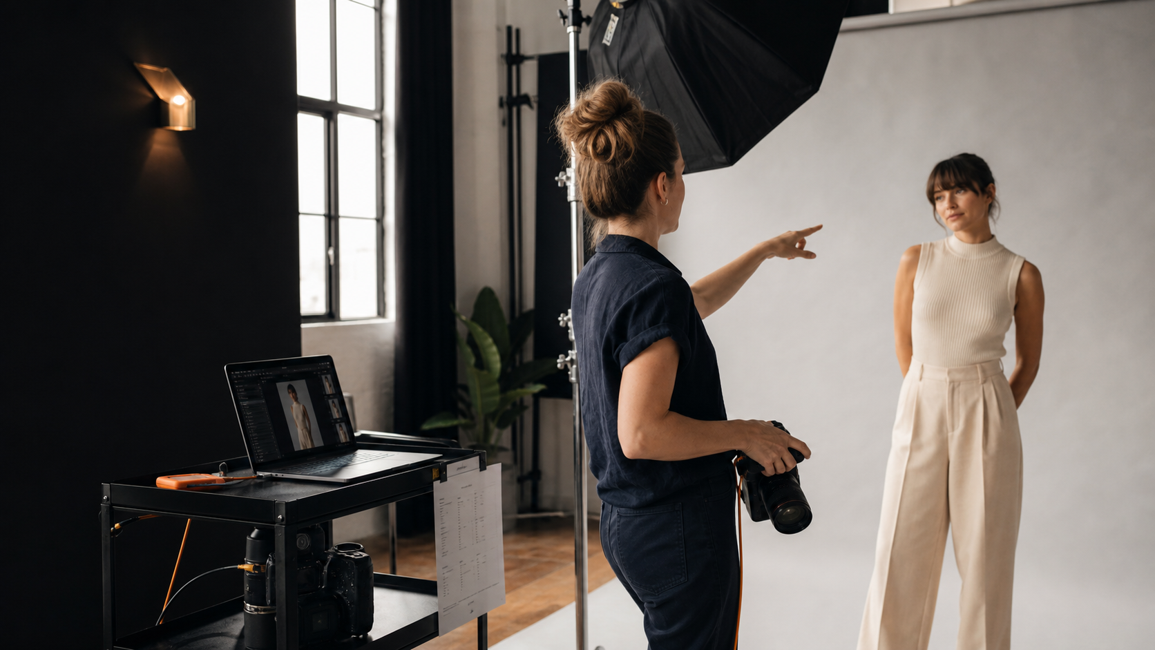 Photographer directing a professional studio shoot